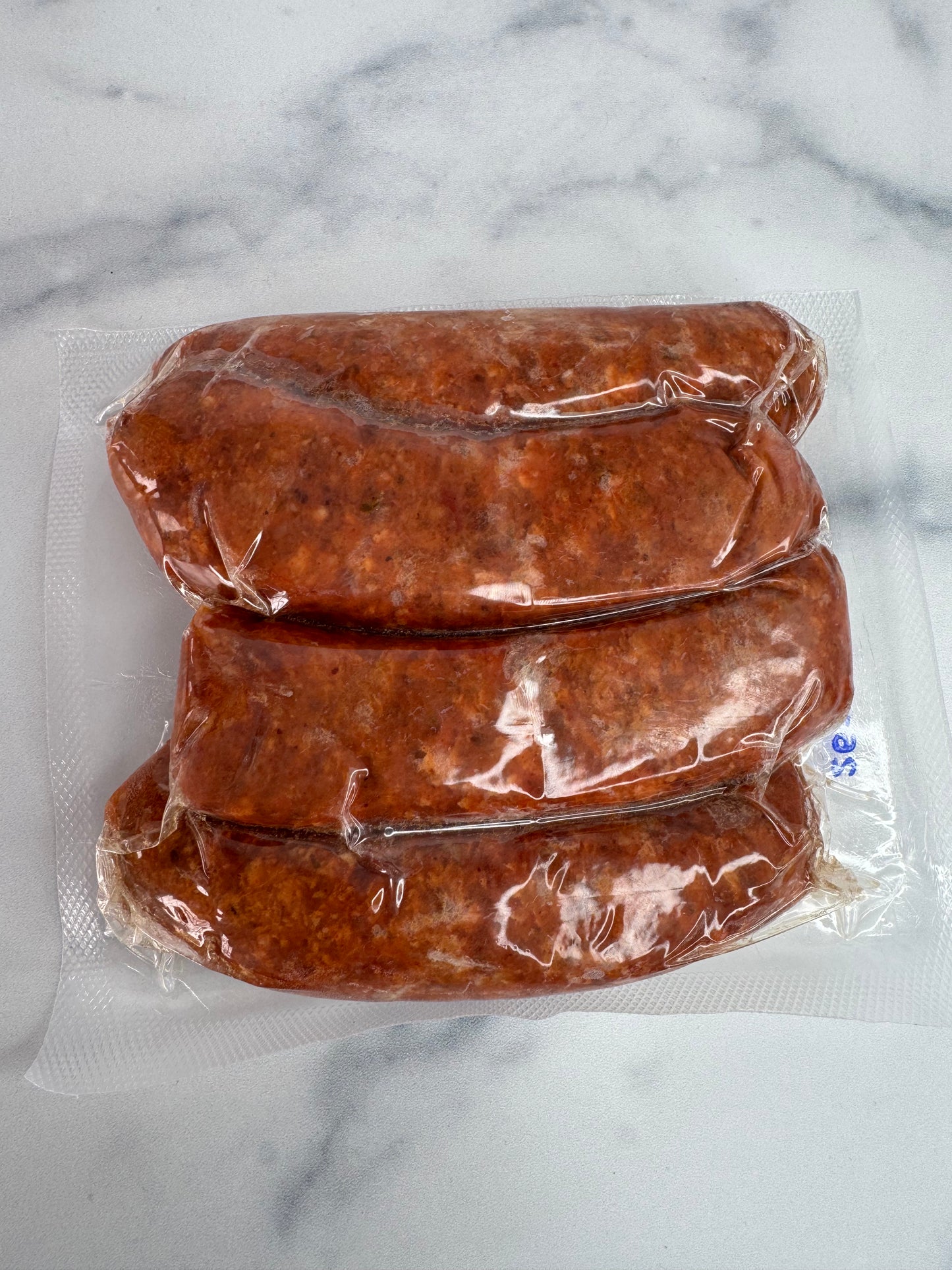 Pork, Buffalo Beef & Bacon Sausage made with Chipotle Chiles & Potato